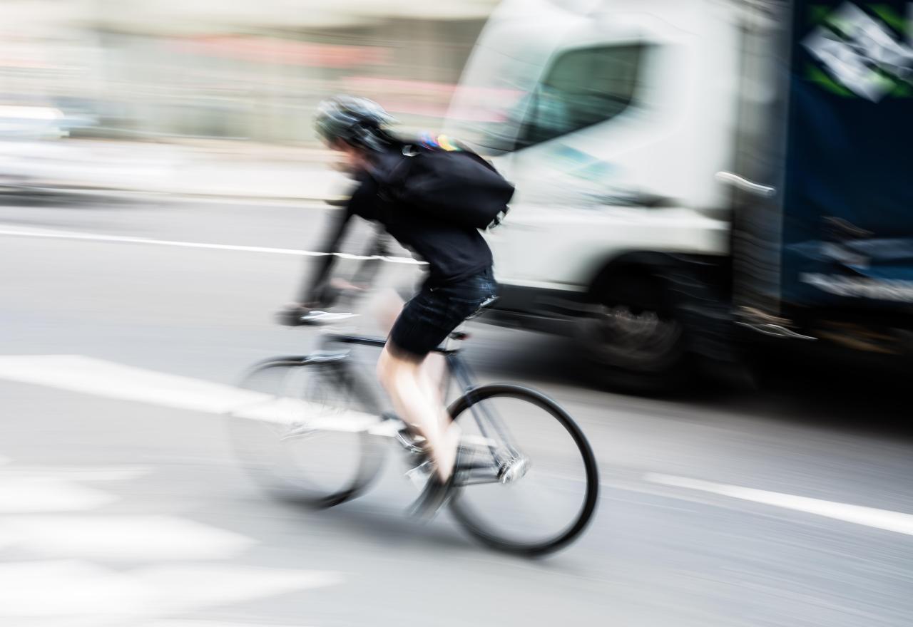 Motorists are required by law when passing a bicycle